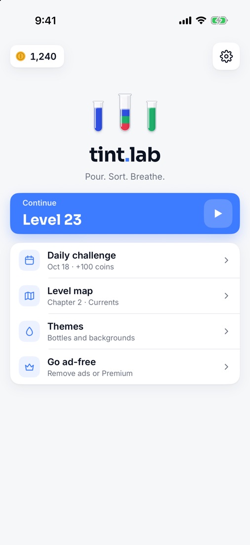 The Tint Lab home screen: Continue level 23, Daily challenge, Level map, Themes and Go ad-free